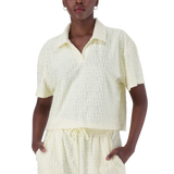 TESSA LEMON EMBOSSED LOGO TOP WITH COLLAR